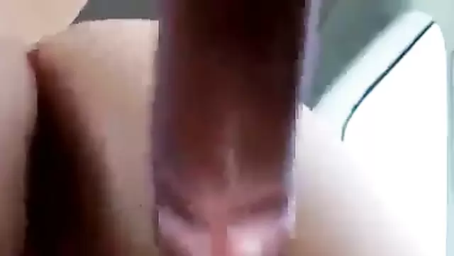Asian babe gets off on thick dildo